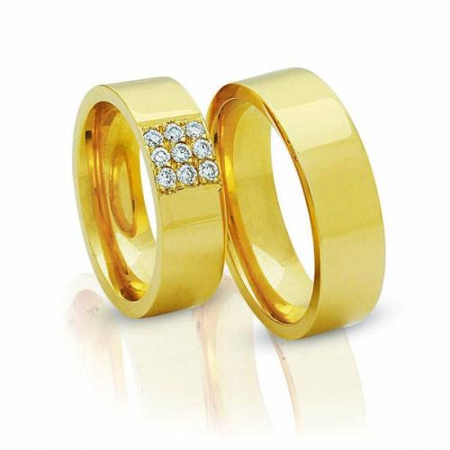 Обручальные кольца из желтого золота фото